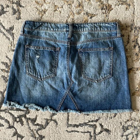 Altar’d State jean skirt with holes and frayed hem. Medium - Picture 2 of 3